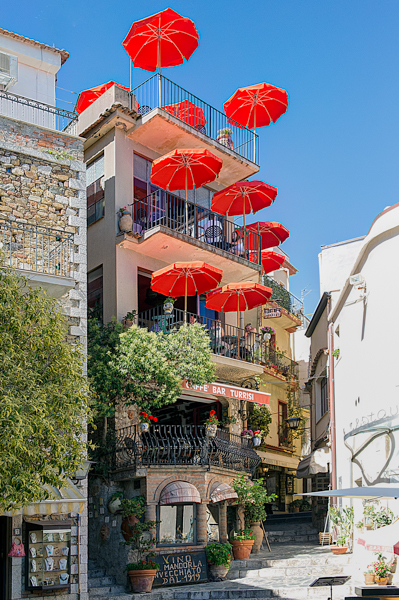 Red Umbrellas of Sicily by Glyn Ridgers